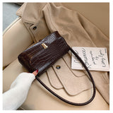 portable One-shoulder small square bag - Namata Newyork